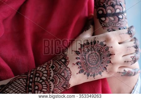 Close Up Of Hena Decorative On Hand Women