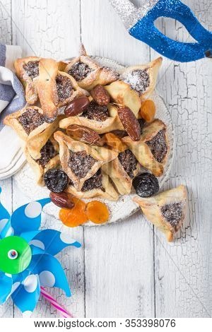 Purim. Hamantaschen .purim Background With Carnival Mask And Hamantaschen Cookies. Holiday Celebrati