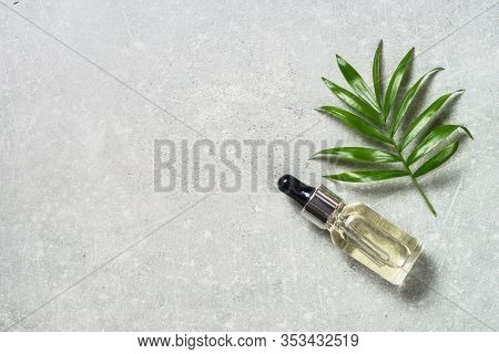 Hyaluronic Acid, Botulin, Face Serum In Vial At Stone Table. Flat Lay Image With Copy Space.