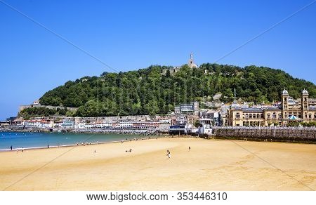 Spain, San Sebastian, May, 12, 2018 - La Concha Beach With View On Of The Mount Urgul - On Top Of It