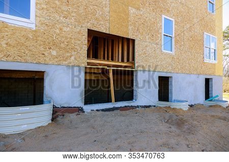 New House Under Construction Window Well Craft Basement Construction