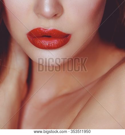 Beautiful woman skin with red lips on white background