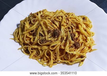 Dish Of Italian Tagliolini With Bolognese Sauce. Tagliolini Alla Bolognese.