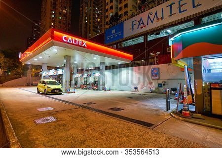 HONG KONG, CHINA - CIRCA JANUARY, 2019: a Caltex station in Hong Kong at night. Caltex is a petroleum brand name of Chevron Corporation.