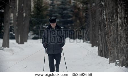 Elderly Grandfather - Old Grandfather Doing Hiking Outdoors At Winter Time