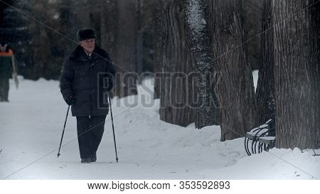 Elderly Grandfather - Old Grandfather Doing Hiking In Winter Time