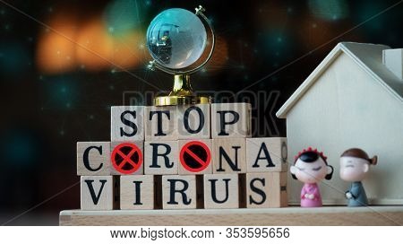 Concept Coronavirus. Prevent Or Stop The Spread Of The Covic-19 Worldwide. Letters On The Wooden Flo
