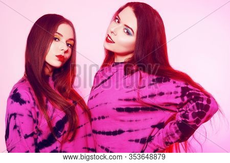 2 Girls In The Same Things With Bright Makeup. Brunette Girls, Sisters, Girlfriends, Twins. Women's 