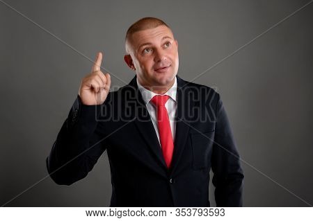Businessman Dressed In A Black Suit Came Up With A Good Idea