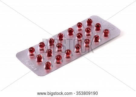 Pills Red Balls In A Blister Isolated