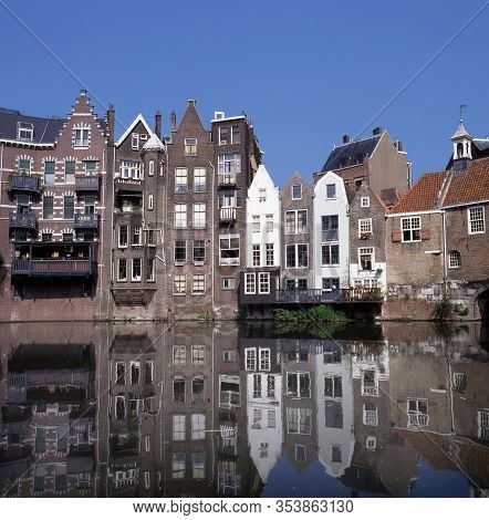 Historic Cityscape Along A Channel In Delfshaven, A District Of Rotterdam, The Netherlands