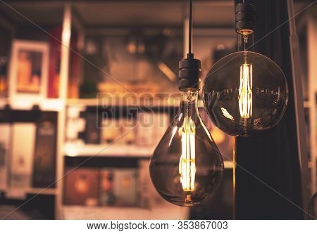 Two Bulbs In The Unknown Furniture Shop. Hugge Concept. Comfortable And Cosy Home Feeling.