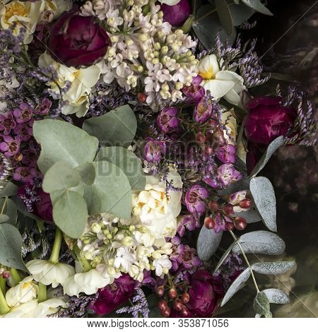 Variety Of Colors Near The Liberty Store In London. Large Bouquets In Tin Vases.