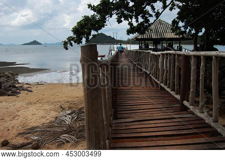 View Landscape Wooden Bridge And Boat Pier Go To Koh Pitak Or Ko Phithak Island In Gulf Of Thailand