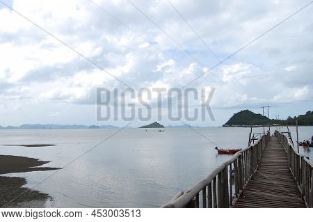 View Landscape Wooden Bridge And Boat Pier Go To Koh Pitak Or Ko Phithak Island In Gulf Of Thailand