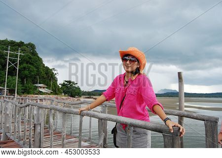 Travelers Thai Women On Wooden Bridge Pier Boat In Sea Ocean On Eastern Shore Of The Gulf Of Thailan