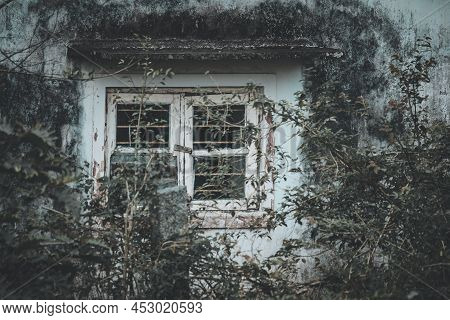 View Of Broken Window In An Old House In The Midst Of A Forest Area In Yercaud, India