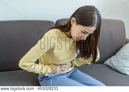 Flatulence Young Asian Woman, Girl Hand In Stomach Ache, Suffer From Food Poisoning, Abdominal Pain 
