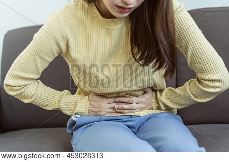 Flatulence Young Asian Woman, Girl Hand In Stomach Ache, Suffer From Food Poisoning, Abdominal Pain 
