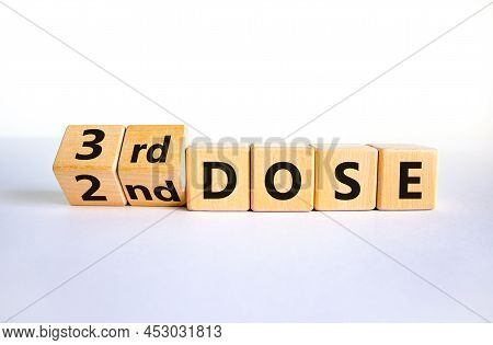 Covid-19 Booster Dose Vaccine Shot Symbol. Turned Cubes And Changed Words '2nd Dose' To '3rd Dose'. 