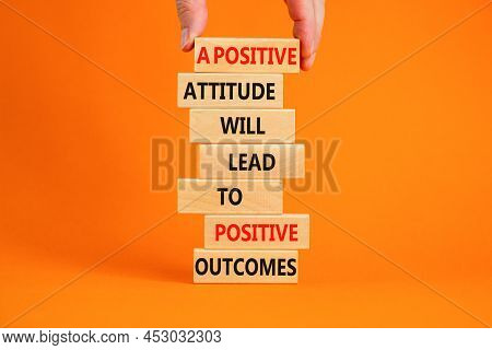 Think Positive Symbol. Wood Blocks With Words A Positive Attitude Will Come To Positive Outcomes. Or