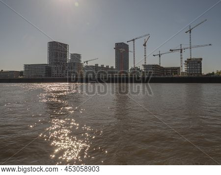 Antwerp, Belgium, April 17, 2020, The Construction Site Of Apartments With Cranes On The Scheldt In 