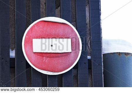 Old Weathered Red Texture Stop Road Sign Hanging Onblack Planks Fene Near Huge Snow On Column