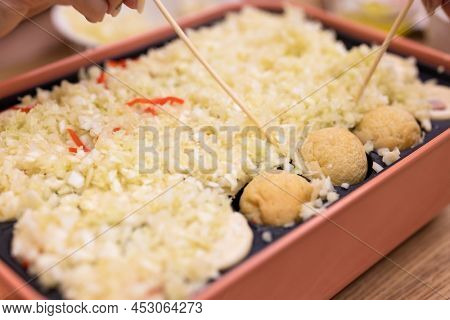 Making takoyaki, Octopus ball at home in the evening