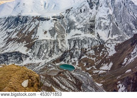 Caucasian Mountain In Summer. Cross Pass In Georgia. View From The Monument Arch Of Friendship Of Pe