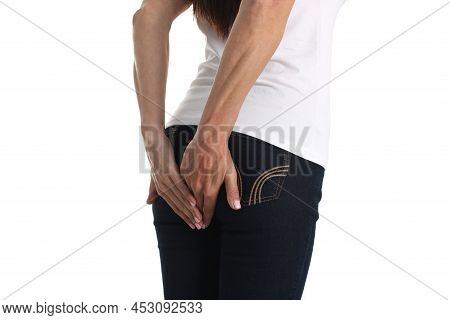 Woman Holds Hands On Anus With Stomach Problems. Diarrhea Causes Diagnosis And Treatment Concept