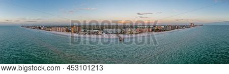 Drone Panorama Over Redington Beach In St. Petersburg In Florida With Pier At Sunset