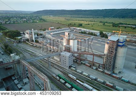 Aerial View Of Cargo Train Cars Loaded With Construction Goods At Mining Factory. Railway Transporta