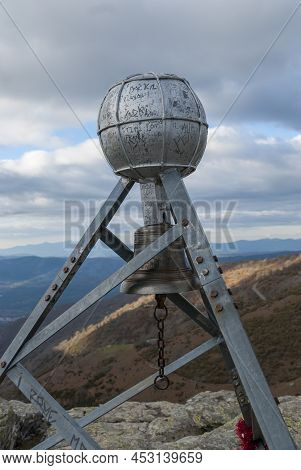 Metallic Structure With Bell On Top Of The Port Of Honduras Extremadura With Blue Sky With Clouds Ve
