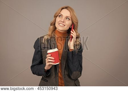 Chattering Girl Talk On Mobile Phone Drinking Coffee Grey Background, Chatterbox