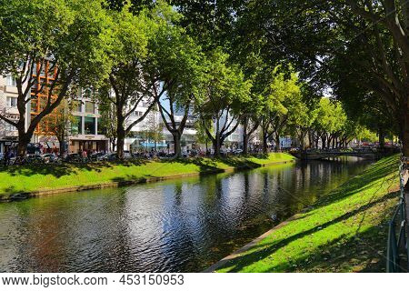 Dusseldorf, Germany - September 19, 2020: People Visit Konigsallee, Famous Shopping Destination In D