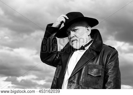 Handsome Fashion Senior Old Mature Man. Elderly Mature Greybeard. Close Up Face Portrait Of Senior. 