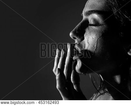 Beautiful Woman With Honey Flows Down On Her Face. Portrait Of Girl With A Honey Facialmask Closeup.