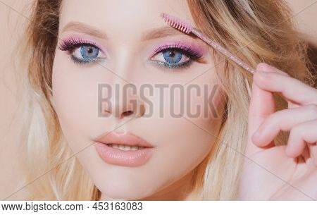 Woman Eye With Beautiful Eyebrows. Perfect Shaped Brow, Eyelashes With Brow Gel Brush. Beautiful Fem