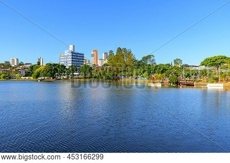 Londrina, Pr, Brazil - December 19, 2021: View Of Igapo Lake And The City Around On A Beautiful Blue