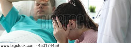 Girl Crying Near Man Lying On Bed In Ward Clinic. Monitoring All Vital Functions Patient. Medicine U