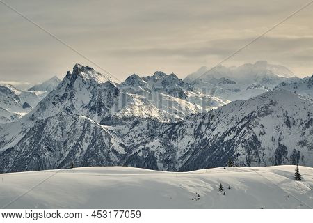 Snowy mountains in winter weather high alpine landscape, ski resort of Paradiski, France