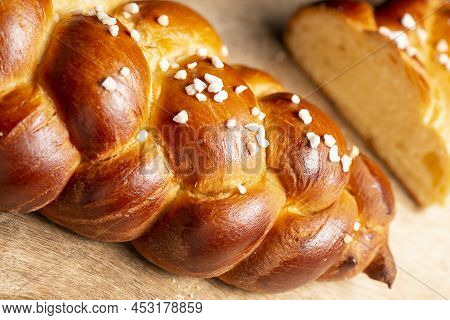 Beautiful Three Braid Golden Baked Bread With Egg Wash And Hail Sugar. Challah Is A Special Bread Of