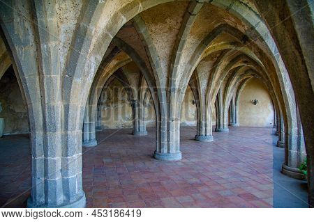 Arches Of The Villa Cimbrone With A View To The Beautiful Mountains Around