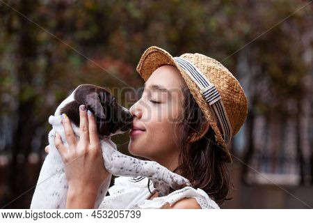 Beautiful Young Girl Having Fun With Her Small French Braque Puppy