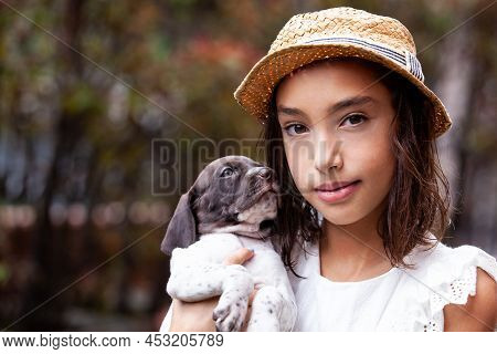 Beautiful Young Girl Having Fun With Her Small French Braque Puppy