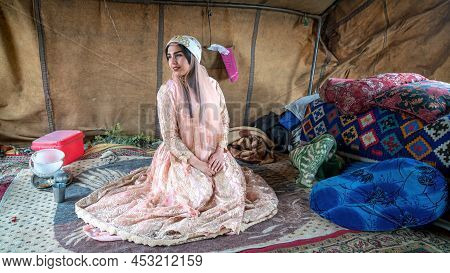 Shiraz, Iran - May 2019: Qashqai Nomadic Woman By Her Tent. The Qasqhai Are Nomadic People Living In