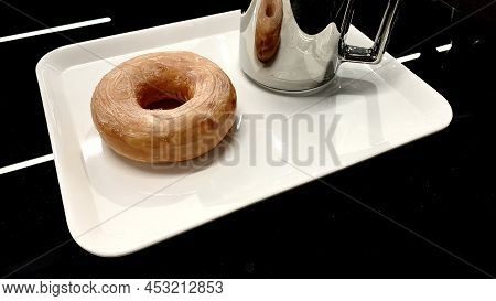 Sweet Bun, Bagel With Sprinkles For Tea. Dessert Served On The Table