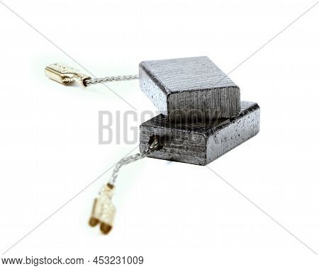 Carbon Brushes Isolated On A White Background. Brushes For Electric Motor.spare Parts For Angle Grin