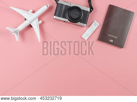 Top View Or Flat Lay Of Covid-19 Negative Test Result Antigen Test Kit (atk) , Camera And  Passport 