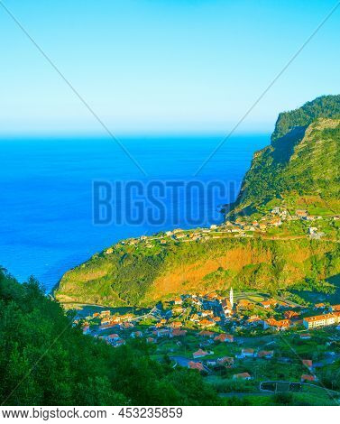 Landscape With Maderia Village, Mountains And Ocean In At Sunset. Madeira Island, Portugal